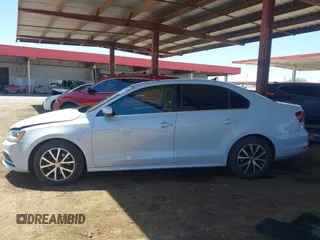 2017 Volkswagen Jetta SE with VIN 3VWDB7AJ9HM286612, listed as a IAAI auction lot 42721128 with 143,458 mi miles and . Bid and sale history available at DreamBid. Image 14.