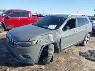 2020 Jeep Cherokee Limited with VIN 1C4PJLDB3LD606091, listed as a IAAI auction lot 41473098 with 49,819 mi miles. Bid and sale history available at carsss.com. Image 2.
