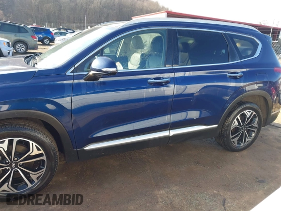 2019 Hyundai Santa Fe Ultimate with VIN 5NMS5CAA6KH117104, listed as a IAAI auction lot 41639157 with 75,507 mi miles and . Bid and sale history available at DreamBid. Image 14.