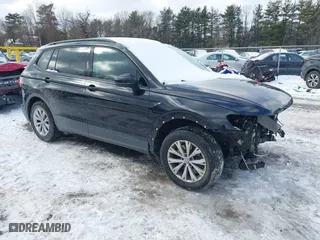 2019 Volkswagen Tiguan S with VIN 3VV0B7AX9KM047642, listed as a IAAI auction lot 41523269 with 61,221 mi miles. Bid and sale history available at carsss.com. Image 1.