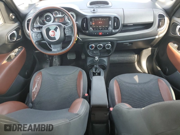 2014 FIAT 500L Trekking with VIN ZFBCFADH4EZ010196, listed as a Copart auction lot 62566094 with 128,519 mi miles and Salvage Title. Bid and sale history available at carsss.com. Image 8.