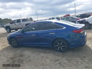 2019 Hyundai Sonata Sport with VIN 5NPE34AF3KH766494, listed as a IAAI auction lot 41677608 with 199,195 mi miles. Bid and sale history available at carsss.com. Image 14.