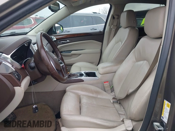 2015 Cadillac SRX Luxury Collection with VIN 3GYFNBE34FS521518, listed as a IAAI auction lot 41893073 with 82,700 mi miles and . Bid and sale history available at carsss.com. Image 5.