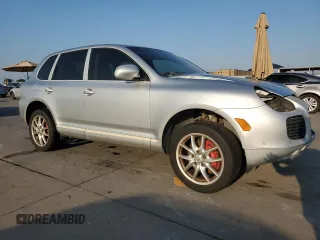 2004 Porsche Cayenne Turbo with VIN WP1AC29P74LA91195, listed as a Copart auction lot 74260594 with 110,729 mi miles and Salvage Title. Bid and sale history available at carsss.com. Image 4.