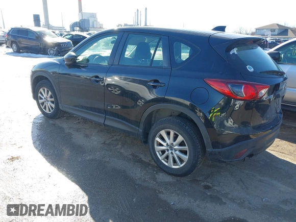 2014 Mazda CX-5 Sport with VIN JM3KE2BE7E0313978, listed as a IAAI auction lot 41437144 with 161,181 mi miles and . Bid and sale history available at carsss.com. Image 3.