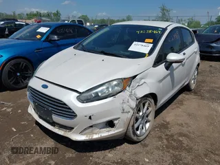 2016 Ford Fiesta SE z VIN 3FADP4EJ7GM137469, wystawiony jako IAAI lot #42278469 z przebiegiem 98 731 mil mil oraz . Historia ofert i sprzedaży dostępna na DreamBid. Obrazek 2.