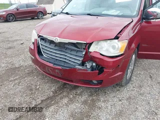 2010 Chrysler Town & Country Limited z VIN 2A4RR7DX7AR366259, wystawiony jako IAAI lot #42310955 z przebiegiem 133 213 mil mil oraz . Historia ofert i sprzedaży dostępna na DreamBid. Obrazek 6.