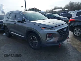 2019 Hyundai Santa Fe Limited with VIN 5NMS5CAD2KH059843, listed as a IAAI auction lot 41271006 with 187,468 mi miles. Bid and sale history available at carsss.com. Image 1.
