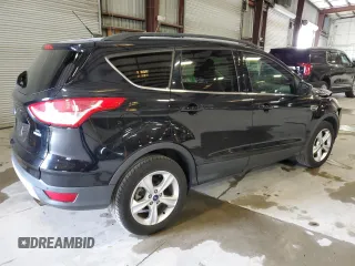 2016 Ford Escape SE with VIN 1FMCU9GX1GUC24692, listed as a Copart auction lot 88102815 with 114,900 mi miles and Salvage Title. Bid and sale history available at DreamBid. Image 3.