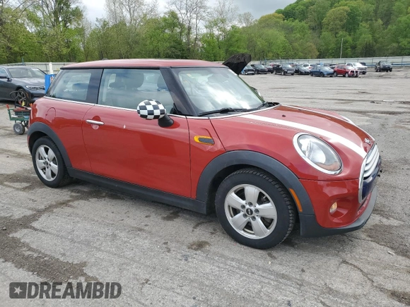 2014 MINI Hardtop with VIN WMWXM5C52ET934803, listed as a Copart auction lot 55284765 with 96,519 mi miles and Salvage title. Bid and sale history available at DreamBid. Image 4.