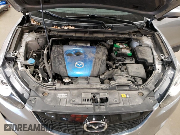 2013 Mazda CX-5 Sport z VIN JM3KE2BE4D0137115, wystawiony jako Copart lot #54487795 z przebiegiem 154 111 mil mil oraz Szkoda całkowita • Salvage title. Historia ofert i sprzedaży dostępna na DreamBid. Obrazek 12.