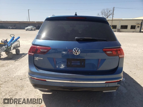 2019 Volkswagen Tiguan SE with VIN 3VV3B7AX4KM061848, listed as a Copart auction lot 49978745 with 100,295 mi miles and Salvage Title. Bid and sale history available at DreamBid. Image 6.