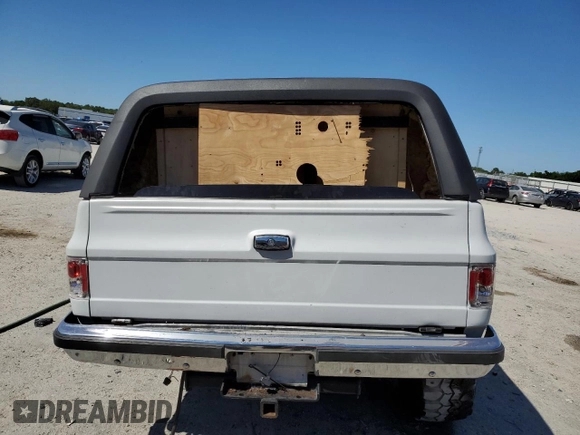 1990 GMC Jimmy z VIN 1GKEV18K4LF509467, wystawiony jako Copart lot #52405495 z przebiegiem 409 007 mil mil oraz Nie do naprawy • Non repairable. Historia ofert i sprzedaży dostępna na DreamBid. Obrazek 6.