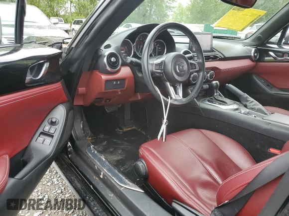 2021 Mazda MX-5 Miata Grand Touring with VIN JM1NDAD78M0455899, listed as a Copart auction lot 57347125 with 38,405 mi miles and Salvage title. Bid and sale history available at DreamBid. Image 8.