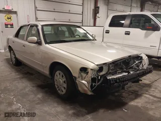 2006 Mercury Grand Marquis GS with VIN 2MEFM74V26X636702, listed as a IAAI auction lot 41556388 with 82,966 mi miles. Bid and sale history available at carsss.com. Image 1.