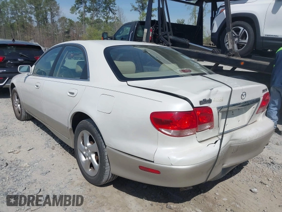 2001 Mazda Millenia with VIN JM1TA221011711379, listed as a IAAI auction lot 41897580 with 151,307 mi miles and . Bid and sale history available at DreamBid. Image 3.