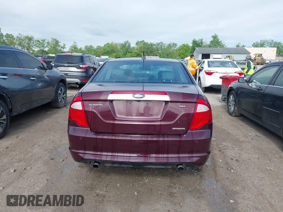 2012 Ford Fusion SEL z VIN 3FAHP0JG8CR410064, wystawiony jako IAAI lot #42290014 z przebiegiem 91 196 mil mil oraz . Historia ofert i sprzedaży dostępna na DreamBid. Obrazek 17.