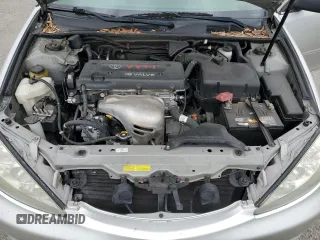 2005 Toyota Camry STD z VIN 4T1BE32K35U558818, wystawiony jako Copart lot #56023365 z przebiegiem 109 917 mil mil oraz Szkoda całkowita • Salvage title. Historia ofert i sprzedaży dostępna na DreamBid. Obrazek 11.