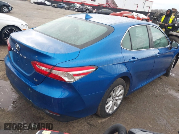 2020 Toyota Camry LE with VIN 4T1C11AK7LU324006, listed as a IAAI auction lot 41486878 with 76,290 mi miles. Bid and sale history available at carsss.com. Image 4.