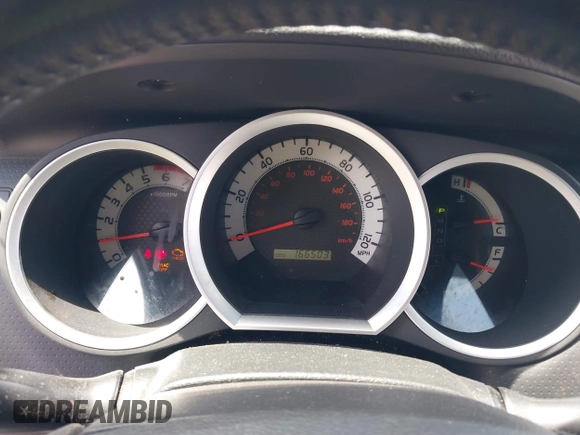 2013 Toyota Tacoma with VIN 3TMLU4EN0DM130912, listed as a IAAI auction lot 42682150 with 166,503 mi miles and . Bid and sale history available at DreamBid. Image 7.