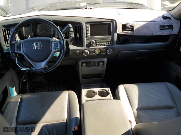 2011 Honda Ridgeline RTL with VIN 5FPYK1F58BB452957, listed as a Copart auction lot 63214204 with 223,311 mi miles and Salvage Title. Bid and sale history available at carsss.com. Image 8.