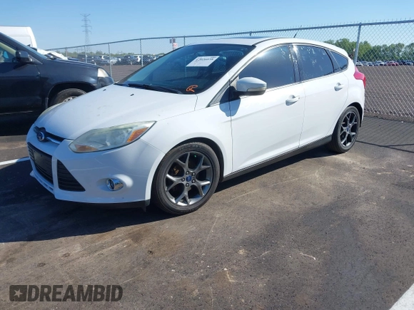 2014 Ford Focus SE with VIN 1FADP3K24EL314209, listed as a IAAI auction lot 42026038 with 167,297 mi miles. Bid and sale history available at carsss.com. Image 2.