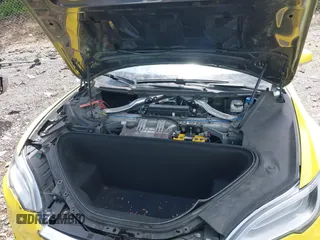 2016 Tesla Model S 70 kWh Battery with VIN 5YJSA1E14GF141579, listed as a IAAI auction lot 42209119 with 105,947 mi miles and . Bid and sale history available at carsss.com. Image 10.