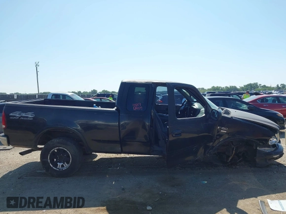 1999 Ford F-150 XL with VIN 1FTRX18L3XKA77743, listed as a IAAI auction lot 42512532 with Not provided miles and . Bid and sale history available at DreamBid. Image 14.