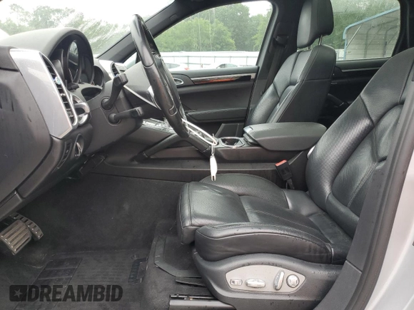 2014 Porsche Cayenne S with VIN WP1AB2A25ELA57213, listed as a Copart auction lot 57843255 with 165,501 mi miles and Salvage title. Bid and sale history available at DreamBid. Image 7.
