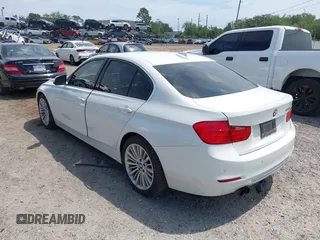 2012 BMW 3 Series 328i with VIN WBA3A5C51CF348290, listed as a IAAI auction lot 41867281 with 100,757 mi miles. Bid and sale history available at carsss.com. Image 3.