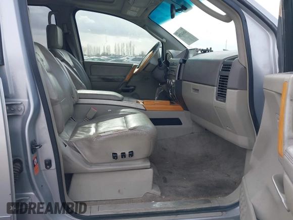 2004 Infiniti QX56 with VIN 5N3AA08C14N811706, listed as a IAAI auction lot 41616710 with 222,954 mi miles. Bid and sale history available at carsss.com. Image 5.