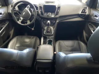 2013 Ford Escape Titanium z VIN 1FMCU9J90DUA98718, wystawiony jako Copart lot #63683005 z przebiegiem 101 036 mil mil oraz Czysty tytuł • Clean title. Historia ofert i sprzedaży dostępna na DreamBid. Obrazek 8.