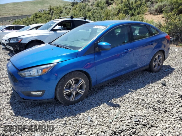 2018 Ford Focus SE z VIN 1FADP3FE1JL246725, wystawiony jako Copart lot #57913225 z przebiegiem 52 247 mil mil oraz Czysty tytuł • Clean title. Historia ofert i sprzedaży dostępna na DreamBid. Obrazek 1.