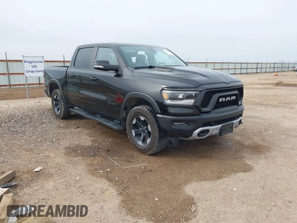2020 Ram 1500 Rebel with VIN 1C6SRFLT5LN113514, listed as a IAAI auction lot 41718662 with 56,730 mi miles and . Bid and sale history available at DreamBid. Image 1.