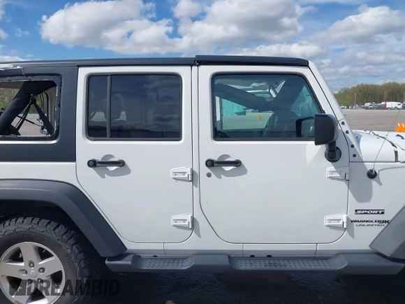 2018 Jeep Wrangler Unlimited Sport S with VIN 1C4BJWDG3JL810853, listed as a IAAI auction lot 42074032 with 141,942 mi miles and . Bid and sale history available at DreamBid. Image 13.