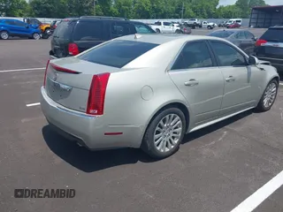 2013 Cadillac CTS Performance with VIN 1G6DK5E31D0146699, listed as a IAAI auction lot 42426214 with 96,520 mi miles and . Bid and sale history available at DreamBid. Image 4.