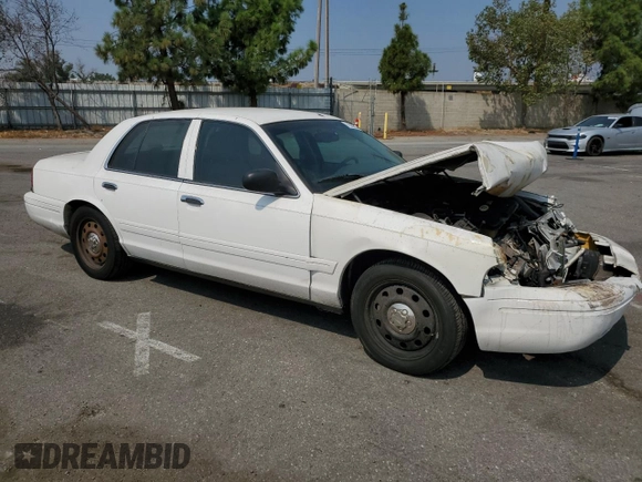 2007 Ford Crown Victoria LX с VIN 2FAFP74V47X119952, выставлен на аукционе Copart как лот 71025704 с пробегом 220 034 миль миль и Списание • Salvage title. История ставок и продаж доступна на DreamBid. Изображение 4.