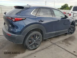 2023 Mazda CX-30 Premium Plus with VIN 3MVDMBEY9PM500907, listed as a Copart auction lot 70871494 with 38,599 mi miles and Salvage title. Bid and sale history available at DreamBid. Image 3.
