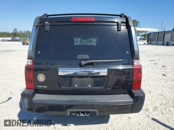 2006 Jeep Commander Limited with VIN 1J8HH58N56C291880, listed as a Copart auction lot 71543874 with 217,366 mi miles and Salvage title. Bid and sale history available at DreamBid. Image 6.