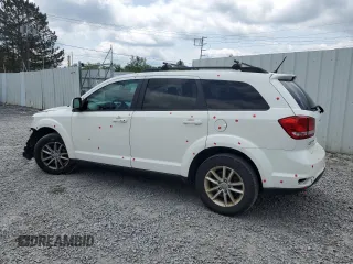 2017 Dodge Journey SXT with VIN 3C4PDDBG0HT542623, listed as a Copart auction lot 61628385 with 130,285 mi miles and Salvage title. Bid and sale history available at DreamBid. Image 2.