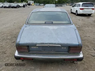 1989 Jaguar XJ with VIN SAJHY1540KC578115, listed as a Copart auction lot 69142274 with Not Provided miles and Clean Title. Bid and sale history available at DreamBid. Image 6.