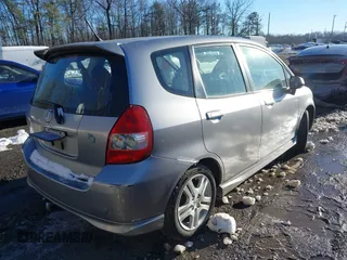 2007 Honda Fit Sport with VIN JHMGD37647S064795, listed as a IAAI auction lot 41299330 with 71,493 mi miles. Bid and sale history available at carsss.com. Image 4.