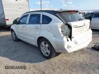 2009 Dodge Caliber SXT with VIN 1B3HB48A69D130857, listed as a IAAI auction lot 41526199 with 163,796 mi miles and . Bid and sale history available at DreamBid. Image 3.