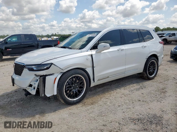2021 Cadillac XT6 Premium Luxury with VIN 1GYKPDRS5MZ233884, listed as a Copart auction lot 58774595 with 47,490 mi miles and Salvage title. Bid and sale history available at DreamBid. Image 1.