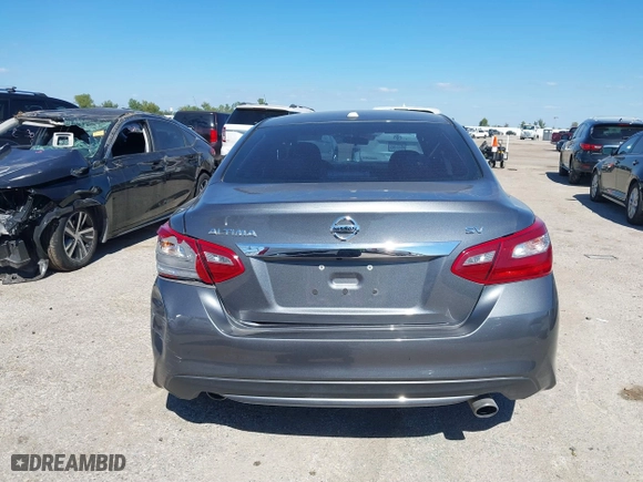 2018 Nissan Altima 2.5 SV with VIN 1N4AL3AP1JC102695, listed as a IAAI auction lot 40440992 with 58,063 mi miles. Bid and sale history available at carsss.com. Image 16.