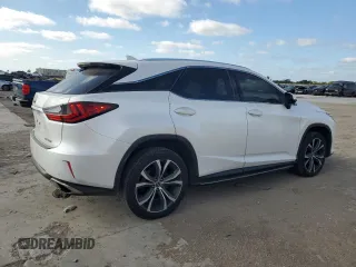 2019 Lexus RX 350 z VIN 2T2ZZMCA5KC133379, wystawiony jako Copart lot #88062035 z przebiegiem 128 962 mil mil oraz Szkoda całkowita • Salvage title. Historia ofert i sprzedaży dostępna na DreamBid. Obrazek 3.