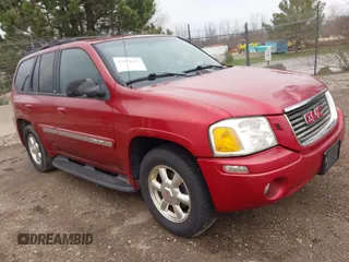 2003 GMC Envoy SLE with VIN 1GKDT13S932334925, listed as a IAAI auction lot 42071477 with 232,935 mi miles. Bid and sale history available at carsss.com. Image 1.