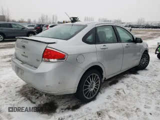 2009 Ford Focus SES with VIN 1FAHP36N19W214689, listed as a Copart auction lot 43001385 with 295,859 mi miles and Salvage Title. Bid and sale history available at carsss.com. Image 3.
