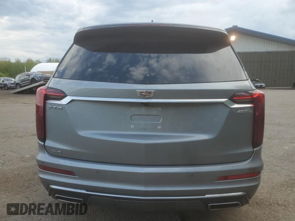 2025 Cadillac XT6 AWD Premium Luxury z VIN 1GYKPDRS8SZ118323, wystawiony jako Copart lot #56156145 z przebiegiem 12 406 mil mil oraz Tytuł czysty. Historia ofert i sprzedaży dostępna na DreamBid. Obrazek 6.