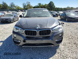 2016 BMW X6 sDrive35i with VIN 5UXKU0C5XG0F92975, listed as a Copart auction lot 74890804 with 64,231 mi miles and Salvage Title. Bid and sale history available at carsss.com. Image 5.